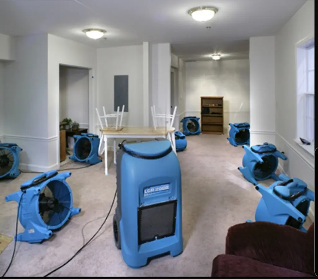 Air movers and dehumidifier setup for Water Extraction & Removal in Morton